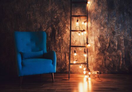 stylish loft interior. rough walls and ladder with lampsの写真素材