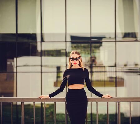 Portrait of a confident woman on the background of an office building. top managerの写真素材