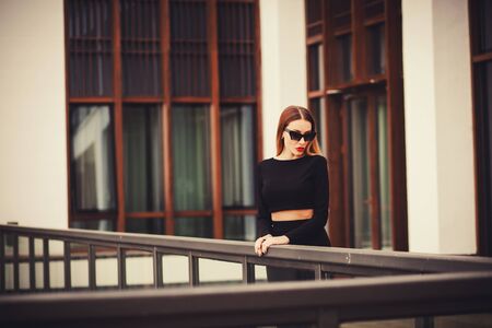 Portrait of a young model  in sunglasses outdoors. concept of beautyの写真素材