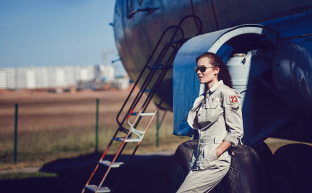 fashionable model in sunglasses aviator and military styleの写真素材