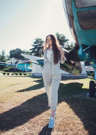 Cool stylish woman wearing eyewear glasses and posing outdoorの写真素材