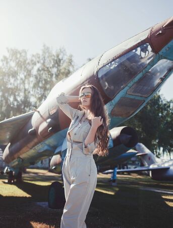stylish woman in military shirt and sunglasses aviatorの写真素材
