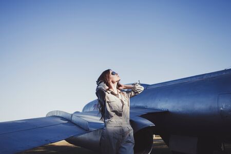 Airplane Pilot: fashion woman model with sunglasses aviatorの写真素材