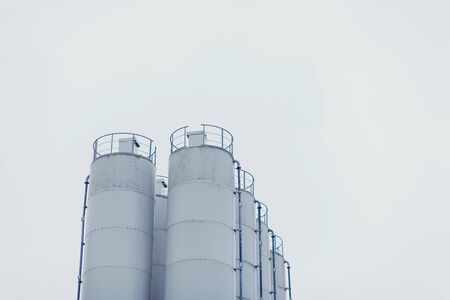 Industrial building exterior against sky. space for textの写真素材