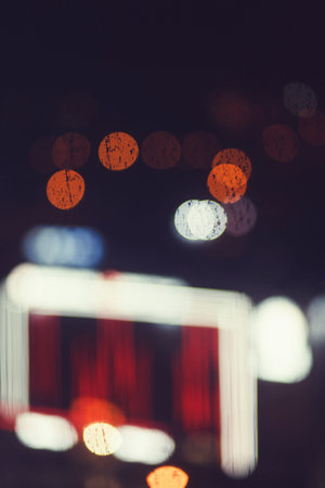 Abstract urban night light bokeh defocused background,