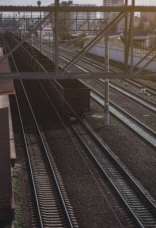 Freight wagons are standing in line at the railway station. の写真素材