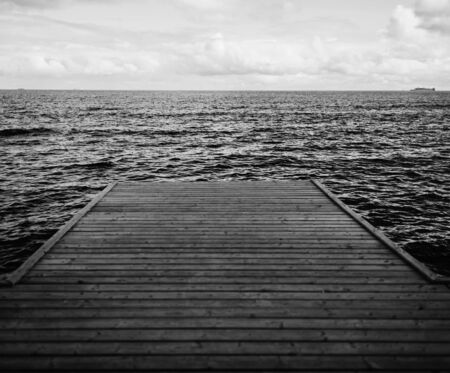 monochrome wooden pier on the sea. minimalismの写真素材