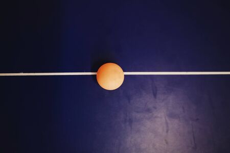 table tennis ball on blue tableの写真素材