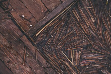 old wooden fishing pier on the lakeの写真素材