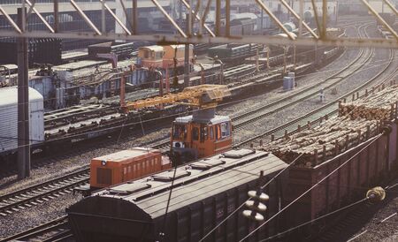 railway depot with freight trains and locomotivesの写真素材