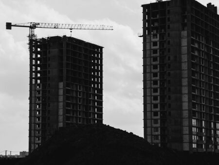 building crane at the background on building under constructionの写真素材