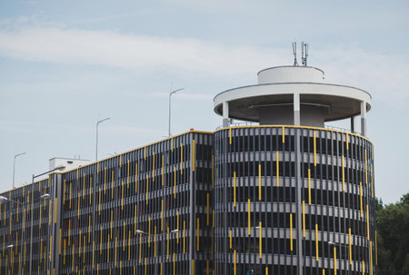 Modern parking lot, round building exterior, abstract fragmentのeditorial素材