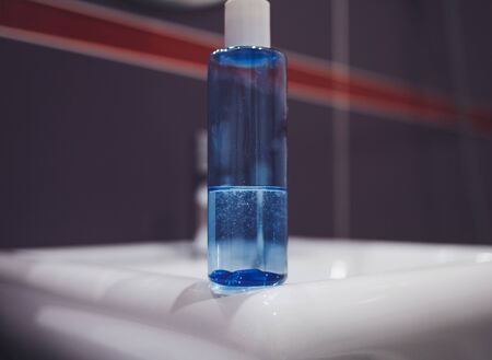blue plastic bottle with antibacterial soapの写真素材