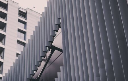 Metallic wall or roof panels. Close-up fragment of minimalist business building interior. Abstract modernの写真素材