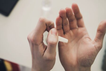 man hand using alcohol wash gel for cleaning sanitizer gel pump dispenser.  health care conceptの写真素材