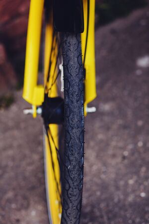 wheel close up of old vintage bicycle in the cityの写真素材