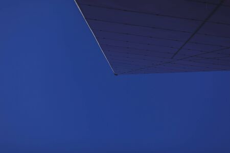 Tall glass office building on sly backgroundの写真素材