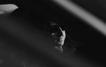 Black and white photo of businessman in glassesの写真素材