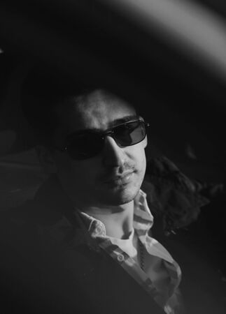 black and white portrait of a successful man. low keyの写真素材
