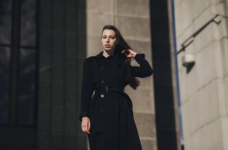 High fashion. Stylish woman in black coatの写真素材