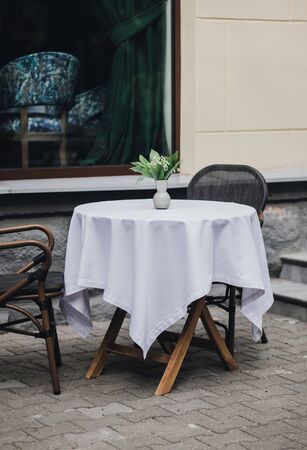 Empty table in between dining hours. Street bistroの写真素材