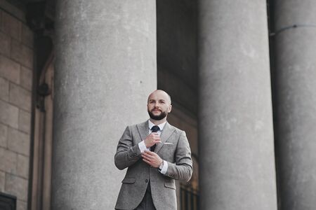 handsome gentleman in an expensive suit and a watch. businessmanの写真素材