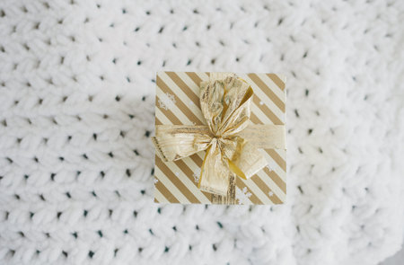 gift box with ribbon in room. christmas season