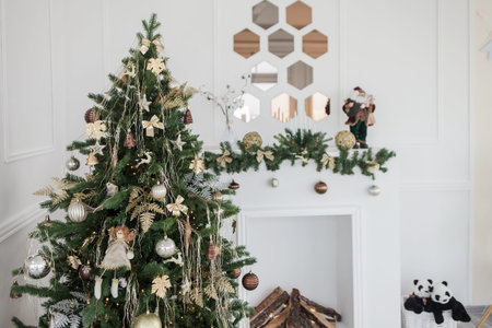 Cozy beautiful modern design of the room in light colors decorated with Christmas tree and...