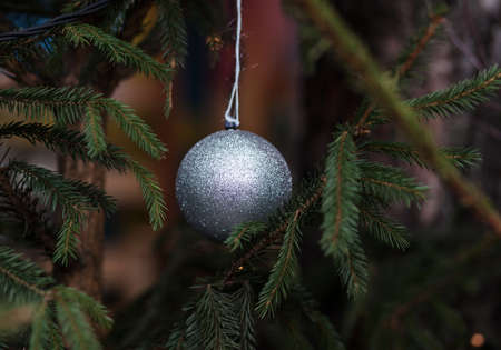 Stylish christmas wreath with red heart, modern decor on store front or building facadeの写真素材