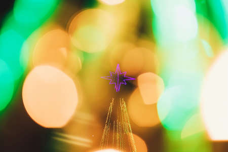 Street decorated with Christmas lights. Christmas mood in the city.の写真素材