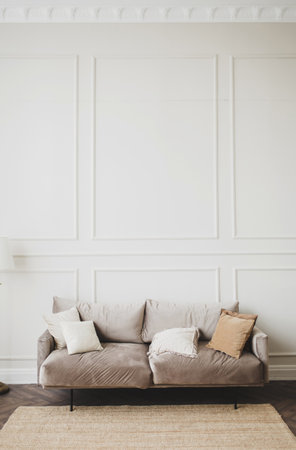 spacious living room with a classic table and chairs in a Scandinavian interiorの写真素材
