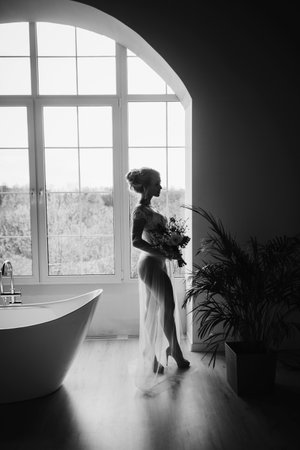 Minimalist interior of bathroom with green houseplantの写真素材