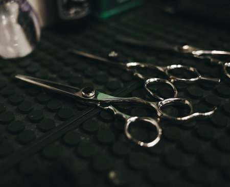 Female master hairdresser does hairstyle and style. Concept Barbershop.