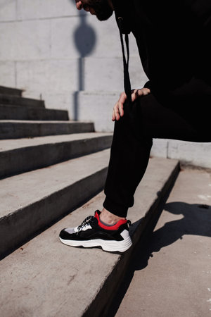 man exercise before run on the road. close up sneakers