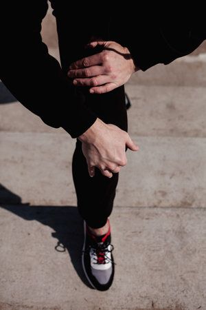 man exercise before run on the road. close up sneakers