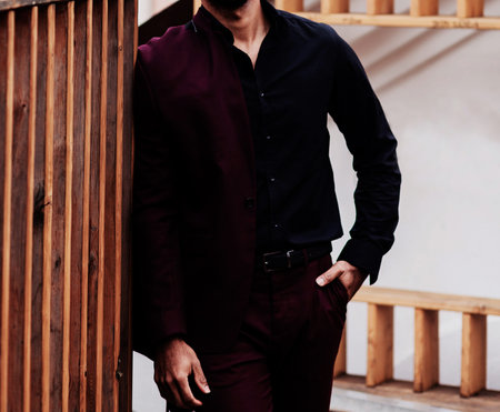 sporty woman carries a bicycle up the steps in an underground passageの写真素材