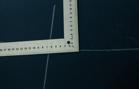 close-up of the tailor's hands at work in the atelier