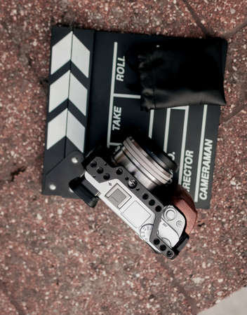 camera and video production equipment on wooden backgroundの写真素材