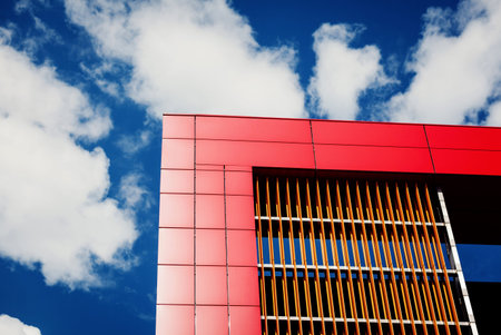 architectural composition of the building fragment. Against the background of the blue sky.
