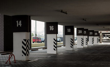 Empty underground parking background. Interior carpark. Large private garage,