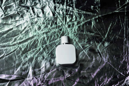 Perfume on self. Trending concept. Women's and men's essence. Natural cosmeticの写真素材
