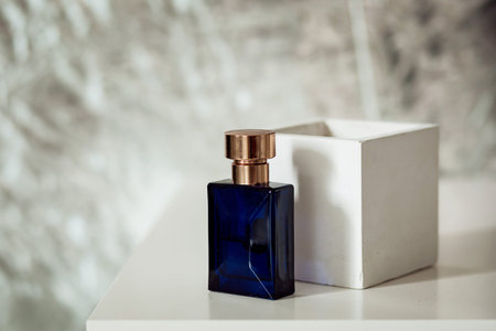 Perfume on self. Trending concept. Women's and men's essence. Natural cosmetic
