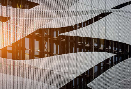 Metal and glass wall material. Abstract modern architecture. Minimalist office building. Contemporary business architecture abstract fragment.の写真素材