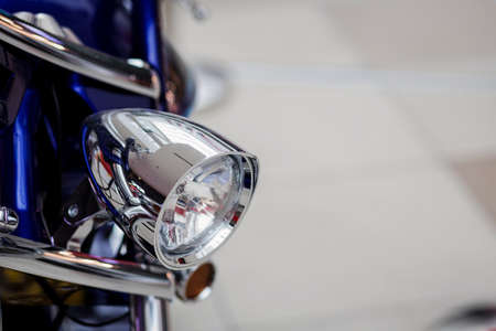chrome headlight of a classic motorcycle or chopper. copy spaceの写真素材