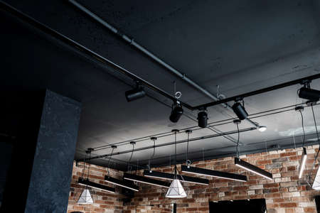 industrial black loft ceiling. lighting.の写真素材