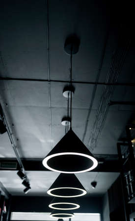 hanging lamps in the loft style. Cold lightの写真素材