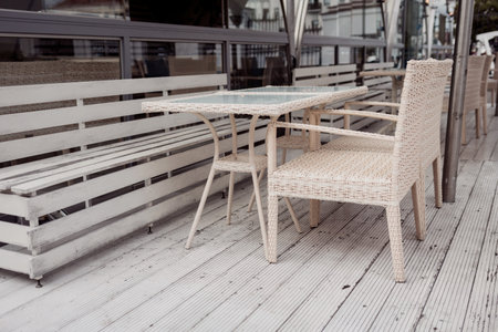 cozy outdoor cafe (bistro) with wicker furniture