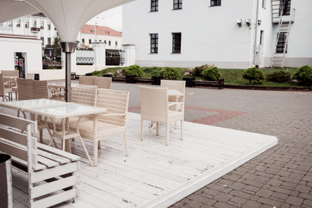 cozy outdoor cafe (bistro) with wicker furnitureの写真素材