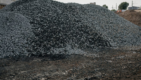 hills of stones for construction industrial. Pile rocks or gravel gray stone textures asphalt mix concrete in road constructionsの写真素材