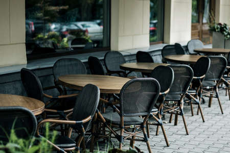 stylish chair made of wood in dark loft interior. copy spaceの写真素材